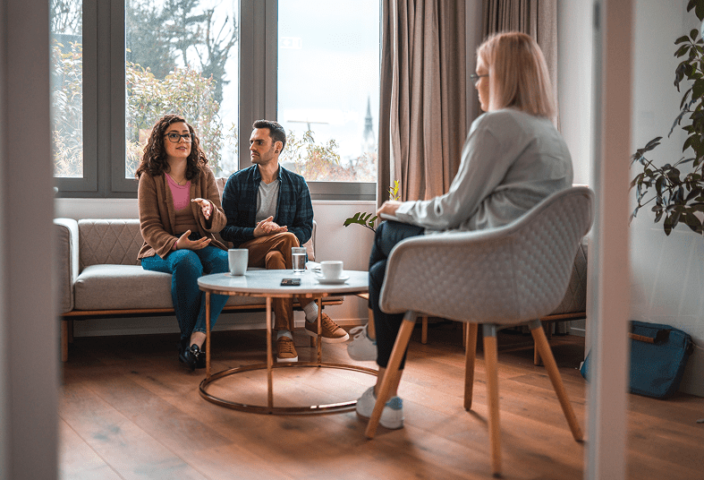 Counseling session with therapist and couple