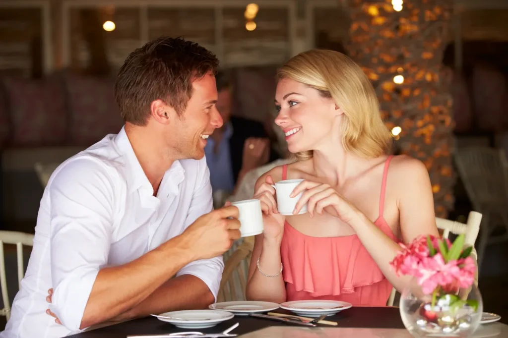 Couple enjoying coffee at a cafe