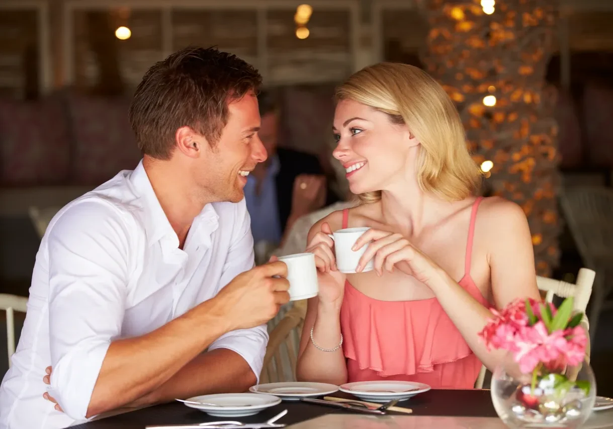 Couple enjoying coffee at a cafe